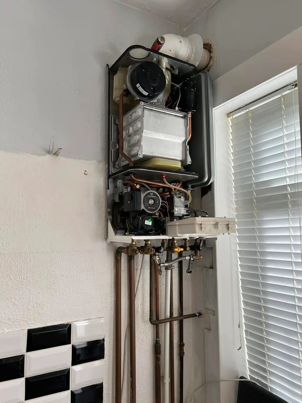 Combi boiler opened up for a repair